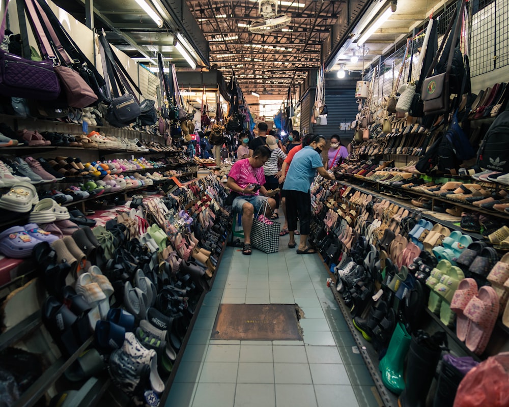 a store filled with lots of shoes and bags