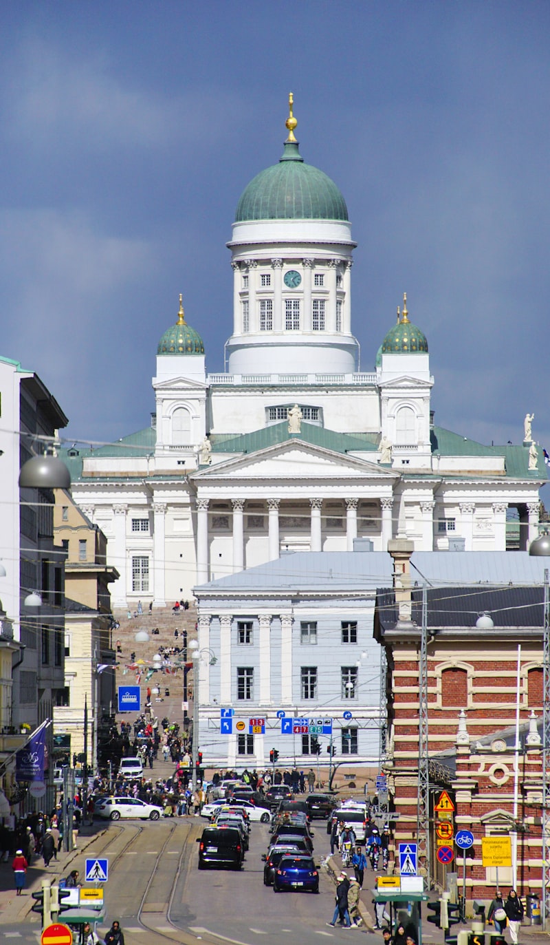 Helsinki Cathedral with its iconic green dome against a blue sky