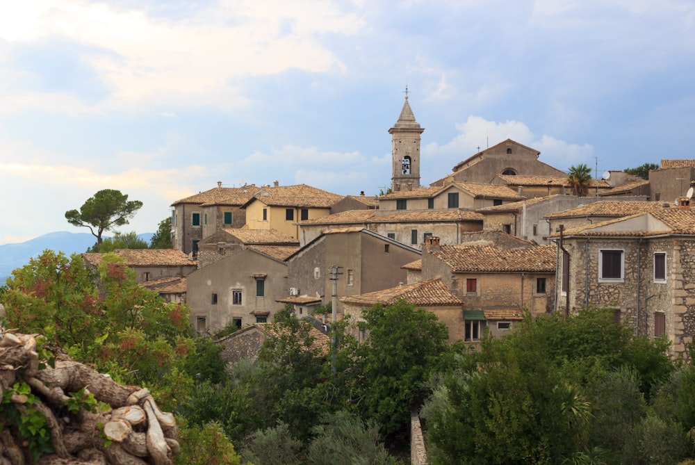 a village with a clock tower on top of it