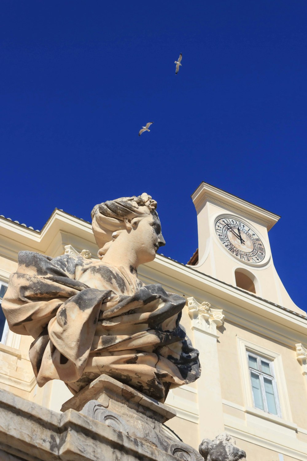 a building with a clock on the top of it