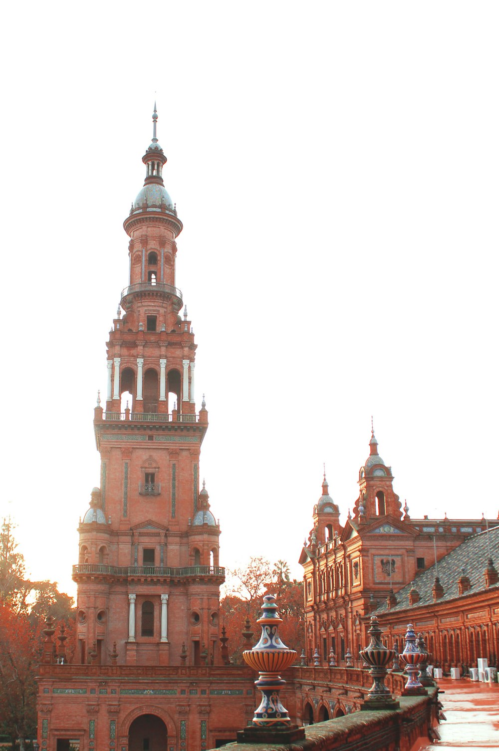 a tall tower with a clock on the top of it