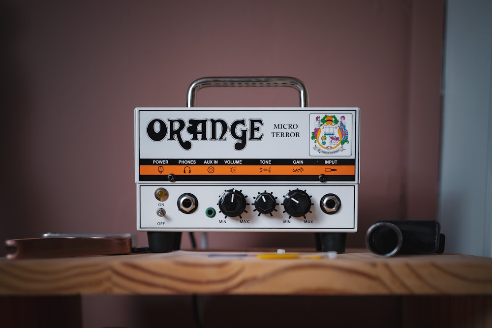 a radio sitting on top of a wooden table