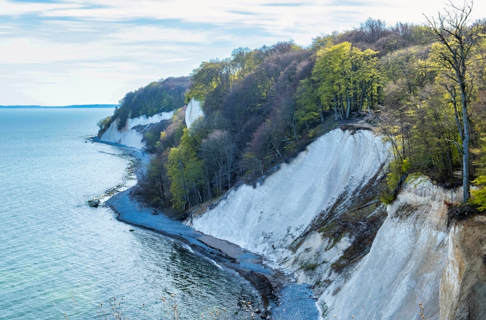 a view of a beach with a cliff on the side of it