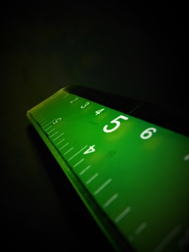 a close up of a ruler on a table
