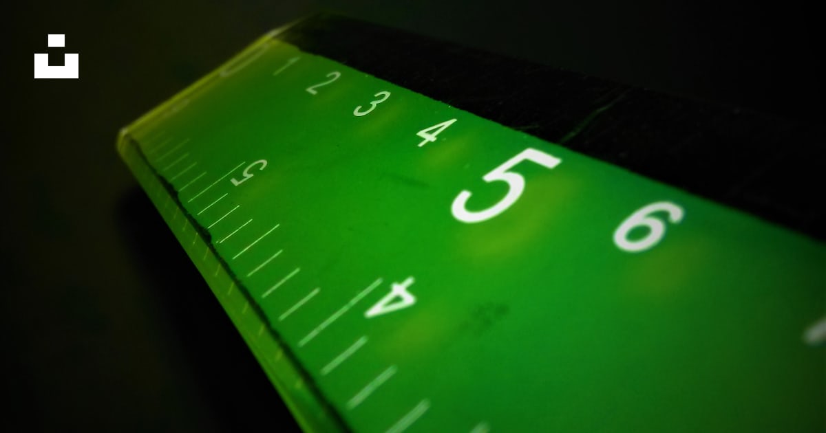 A close up of a ruler on a table photo – Free Green Image on Unsplash