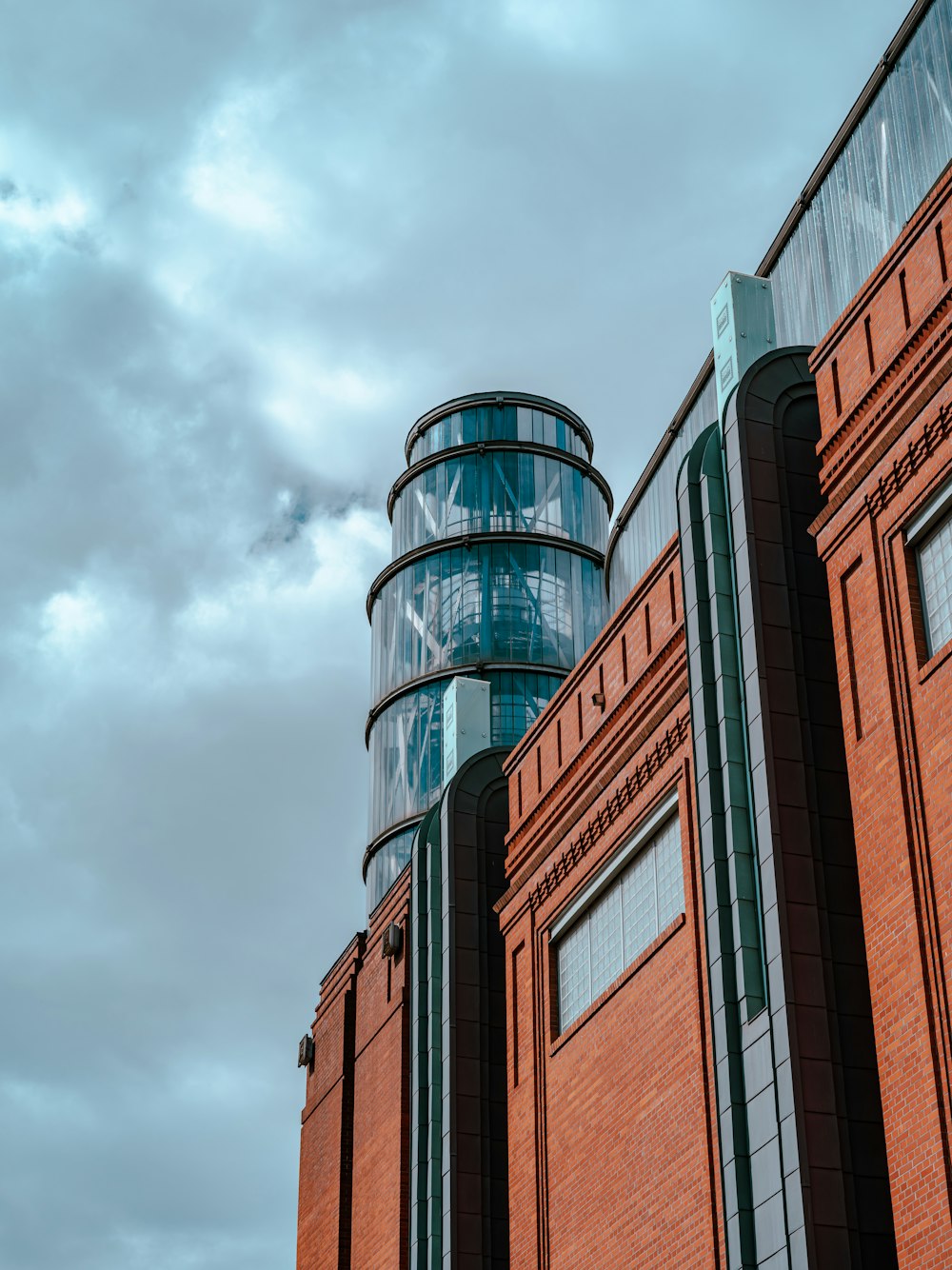 a red brick building with a clock tower on top