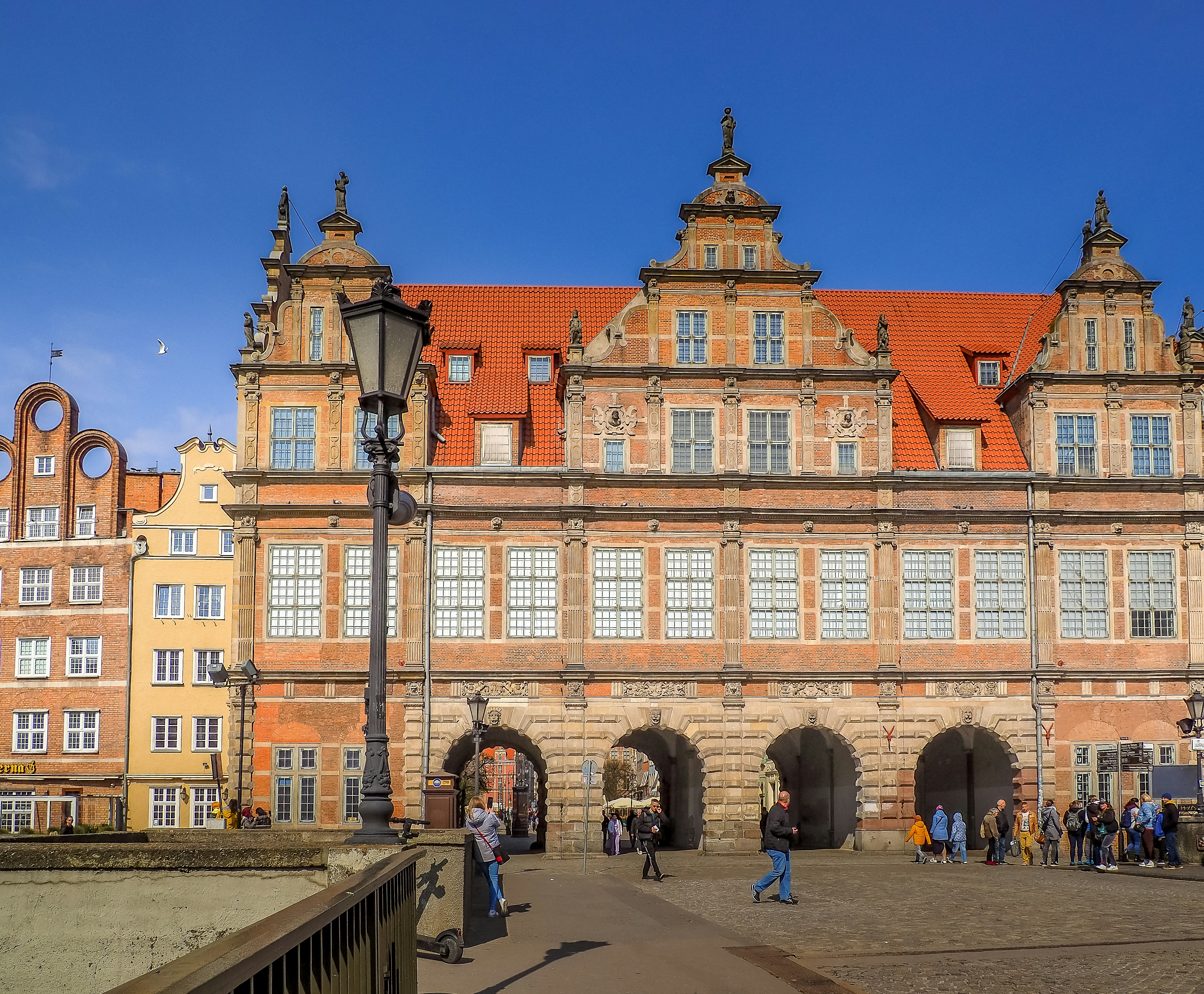 a group of people standing in front of a building