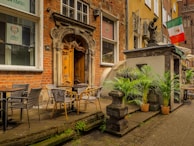 A scenic view of a local restaurant with outdoor seating.