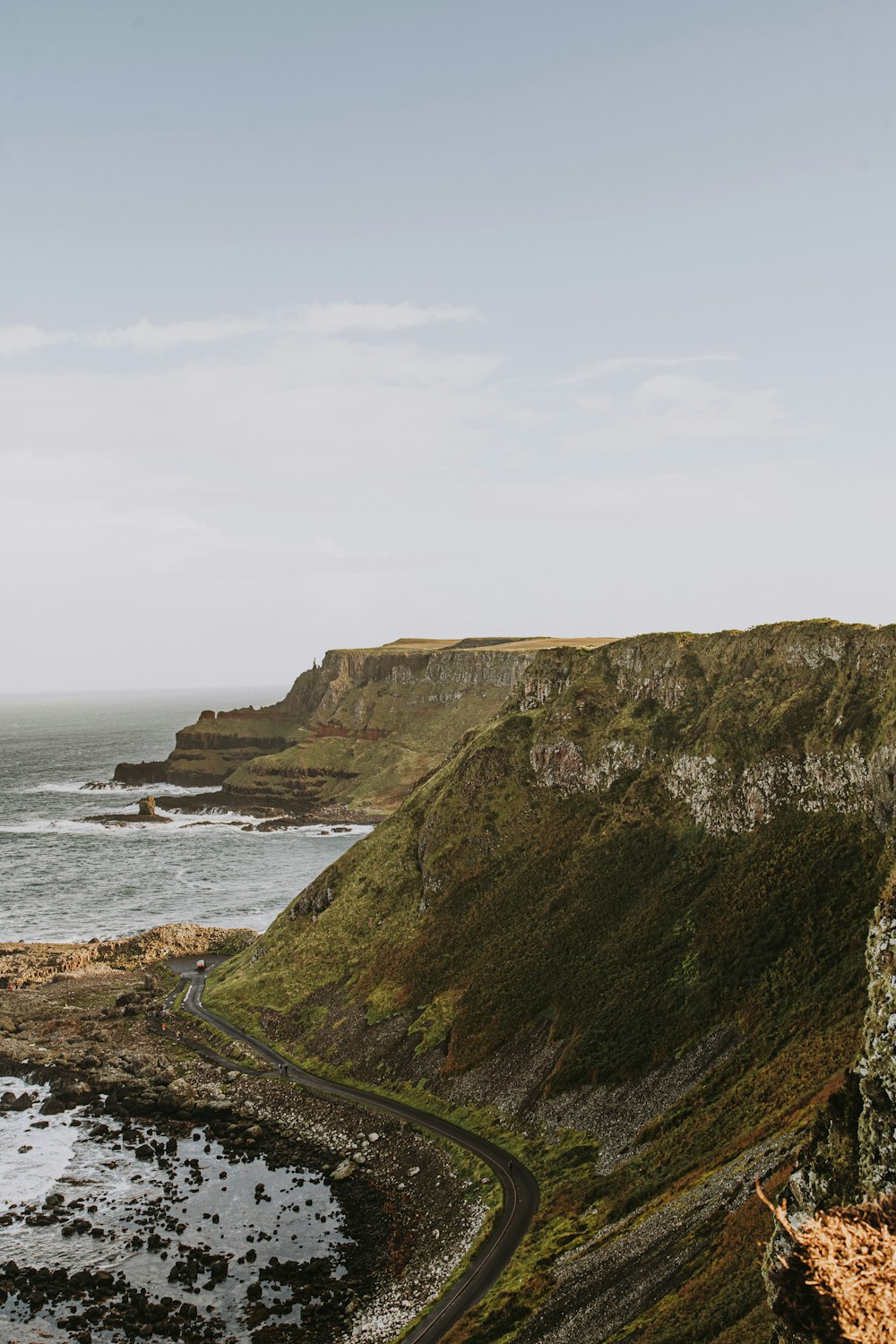 a view of the ocean from a cliff