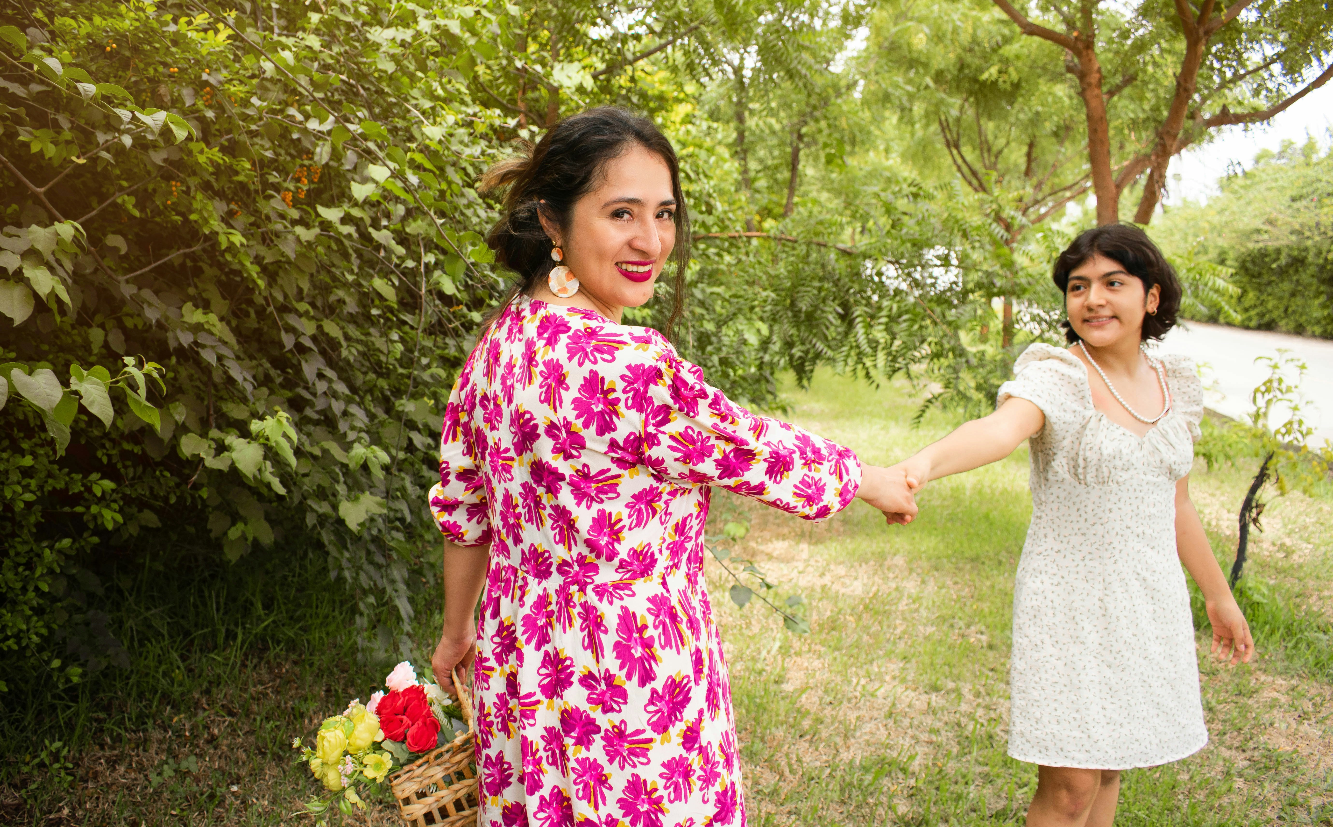 a couple of women standing next to each other
