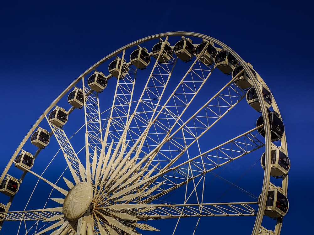 a large ferris wheel on a clear day