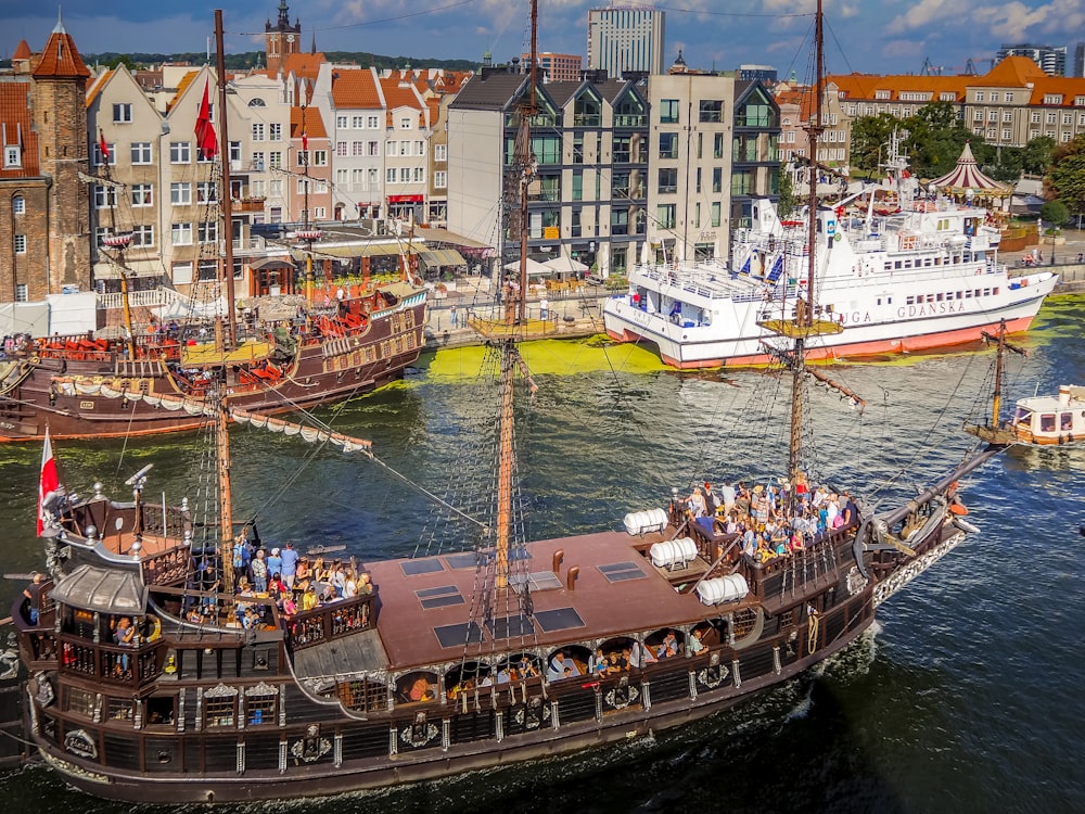 a group of people riding on the back of a boat