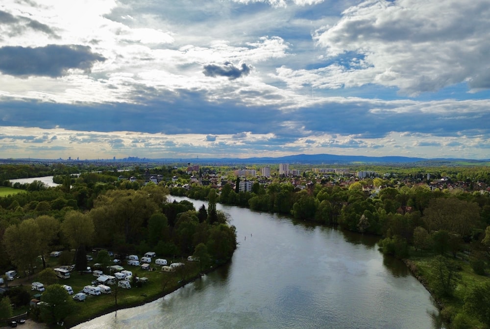 a river running through a lush green countryside