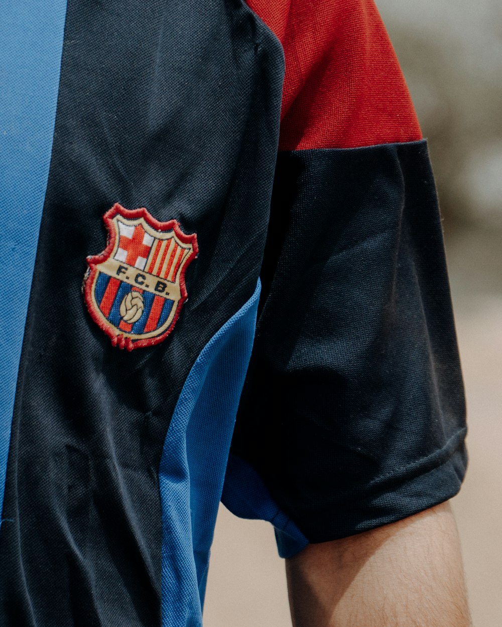 a close up of a man's shirt with a badge on it