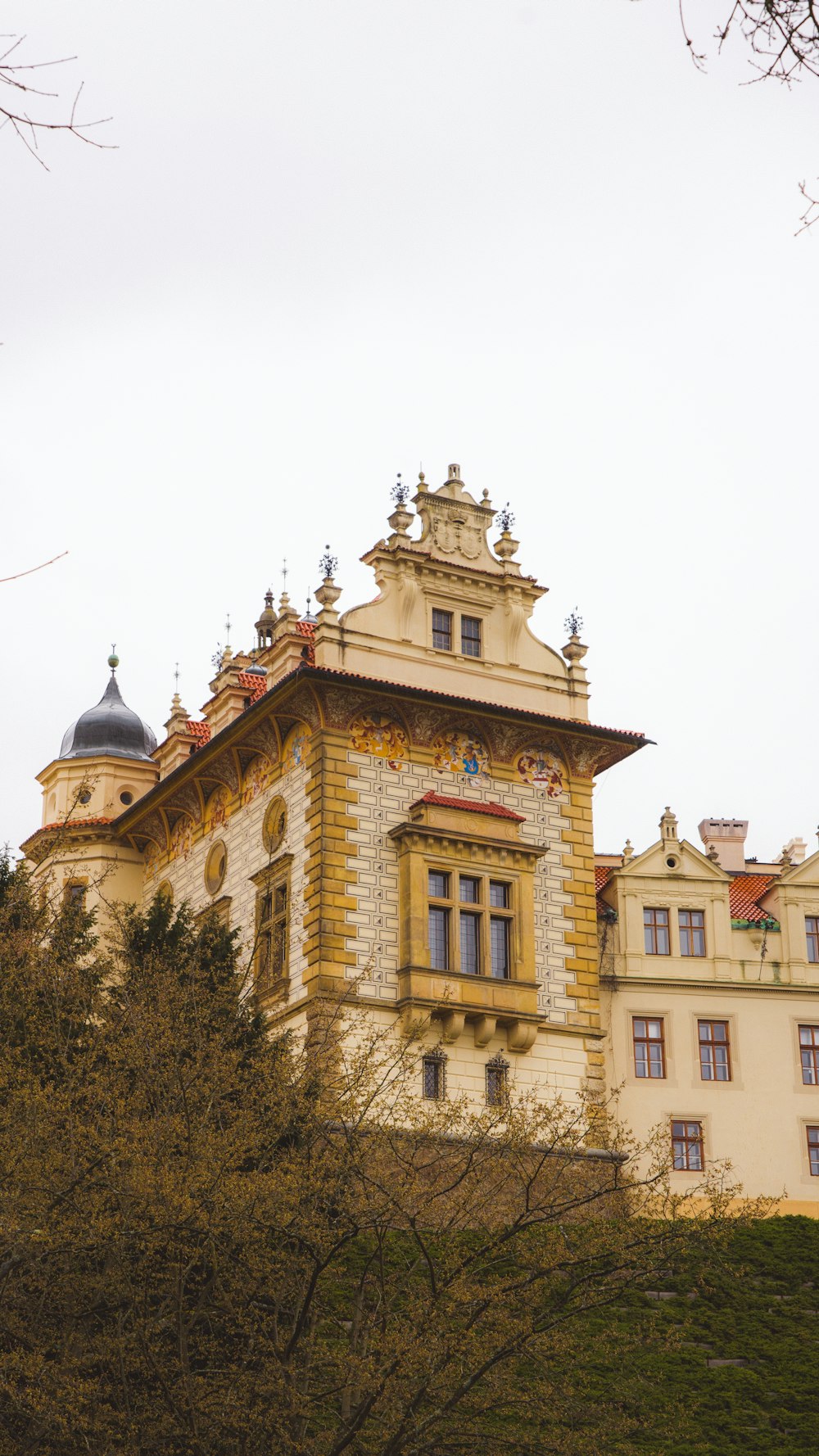 a large building with a clock on the top of it