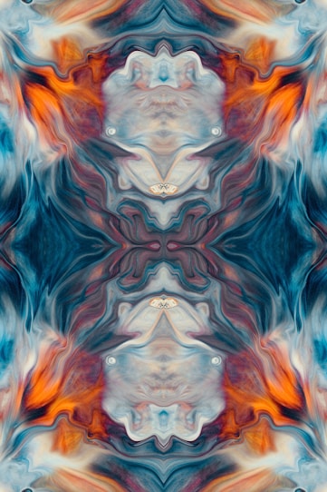 an abstract image of an orange and blue flower