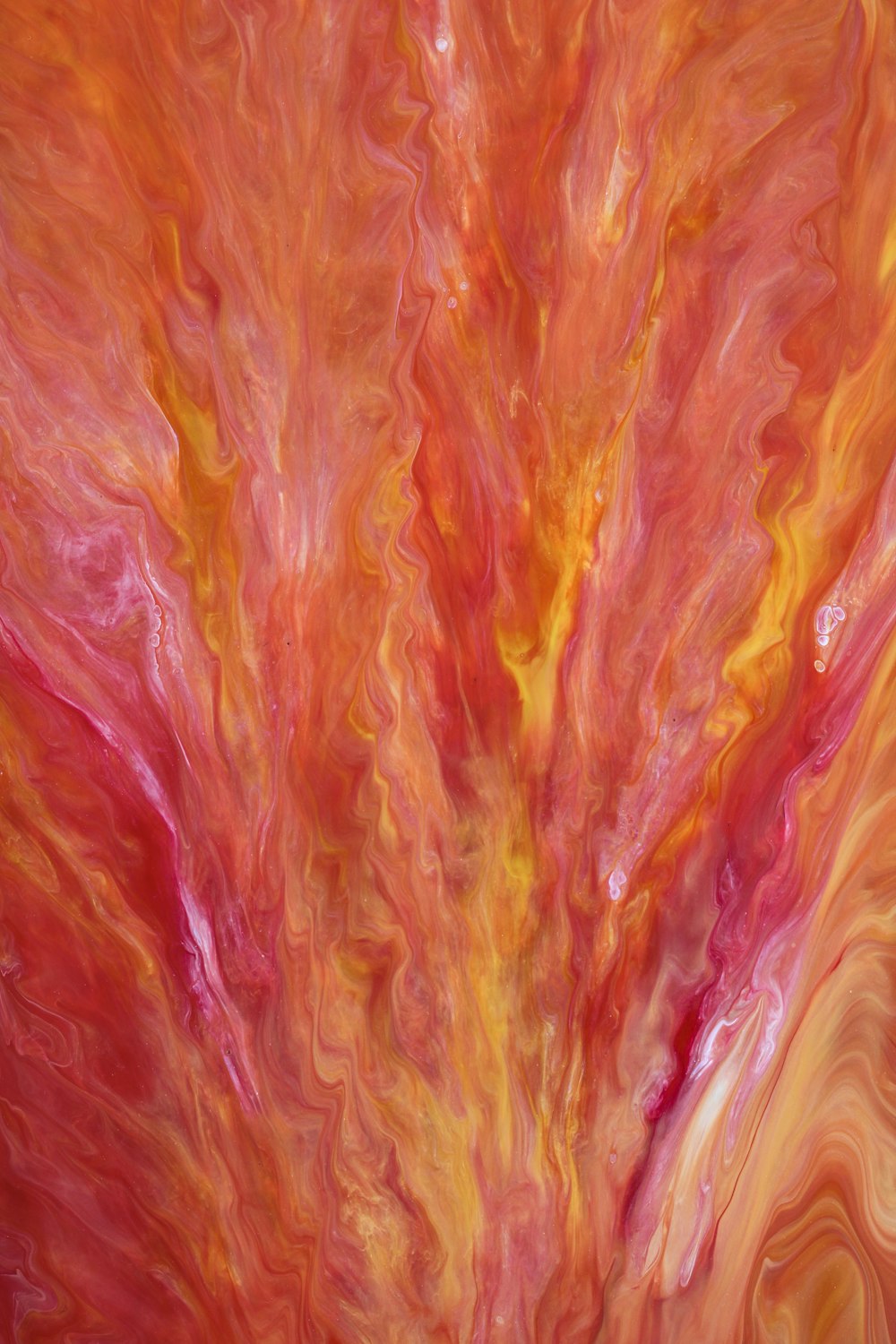a painting of a red and yellow swirl