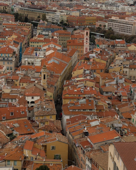 an aerial view of a city with lots of buildings