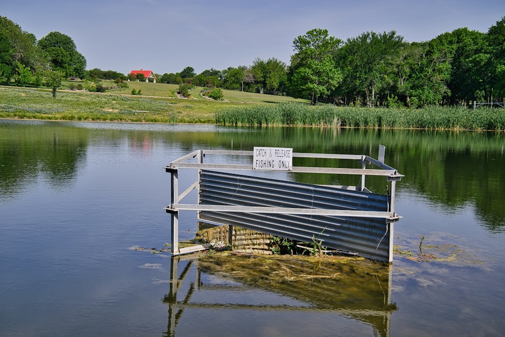 a boat sitting on top of a body of water