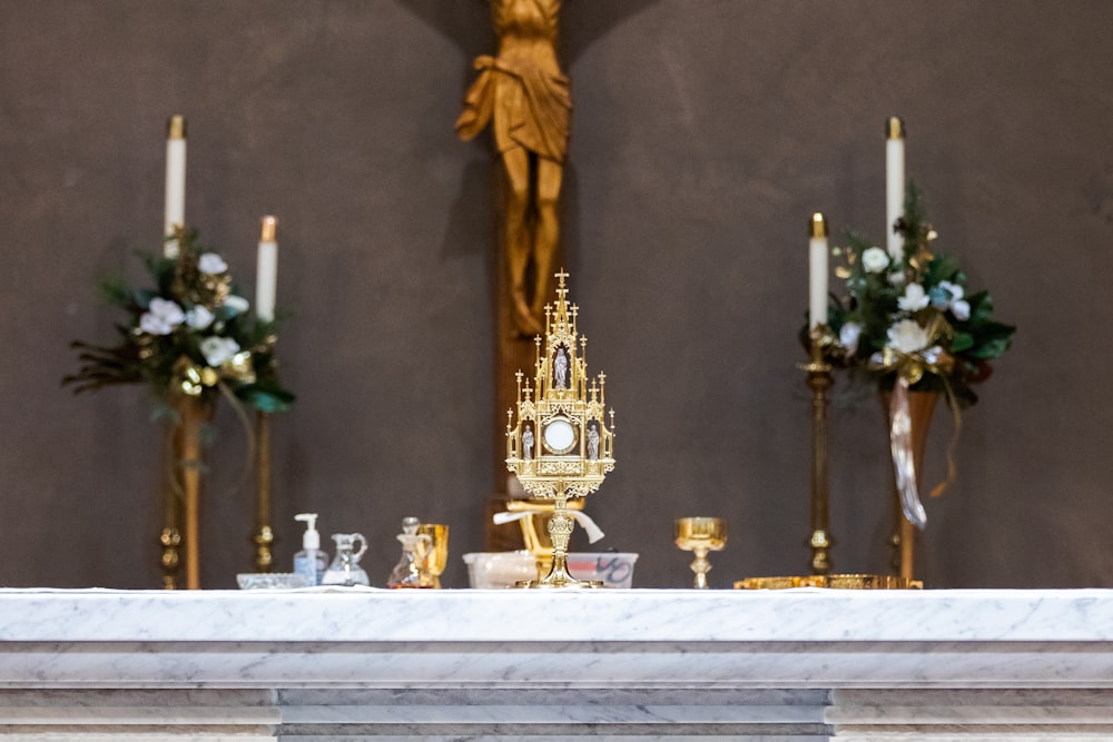 a church altar with candles and a crucifix