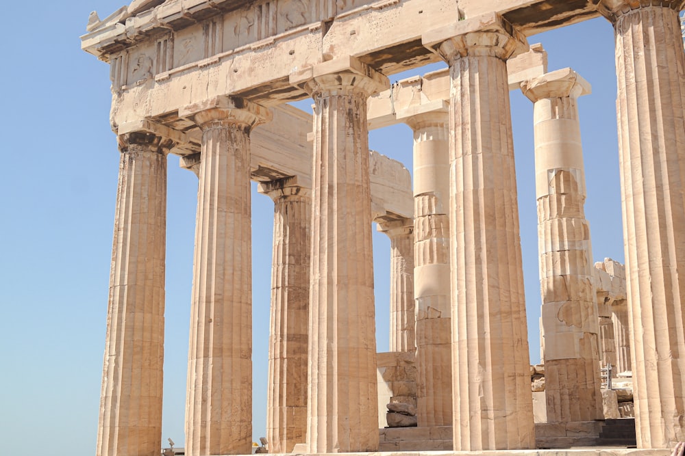 a large stone structure with many columns