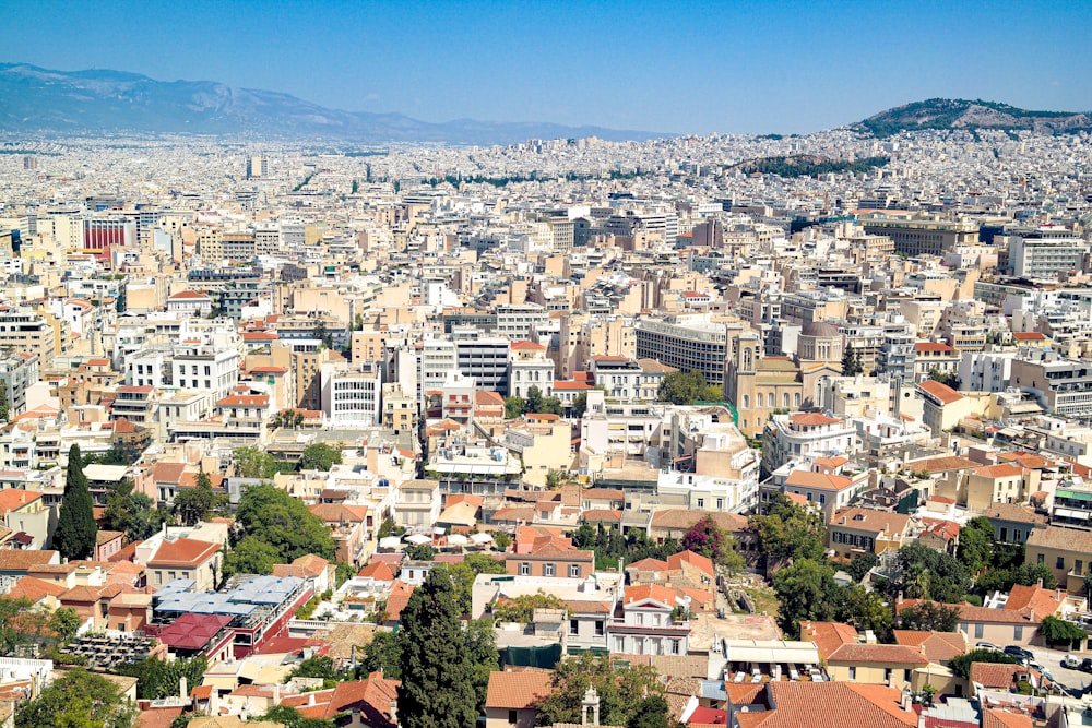 a view of a city from the top of a hill