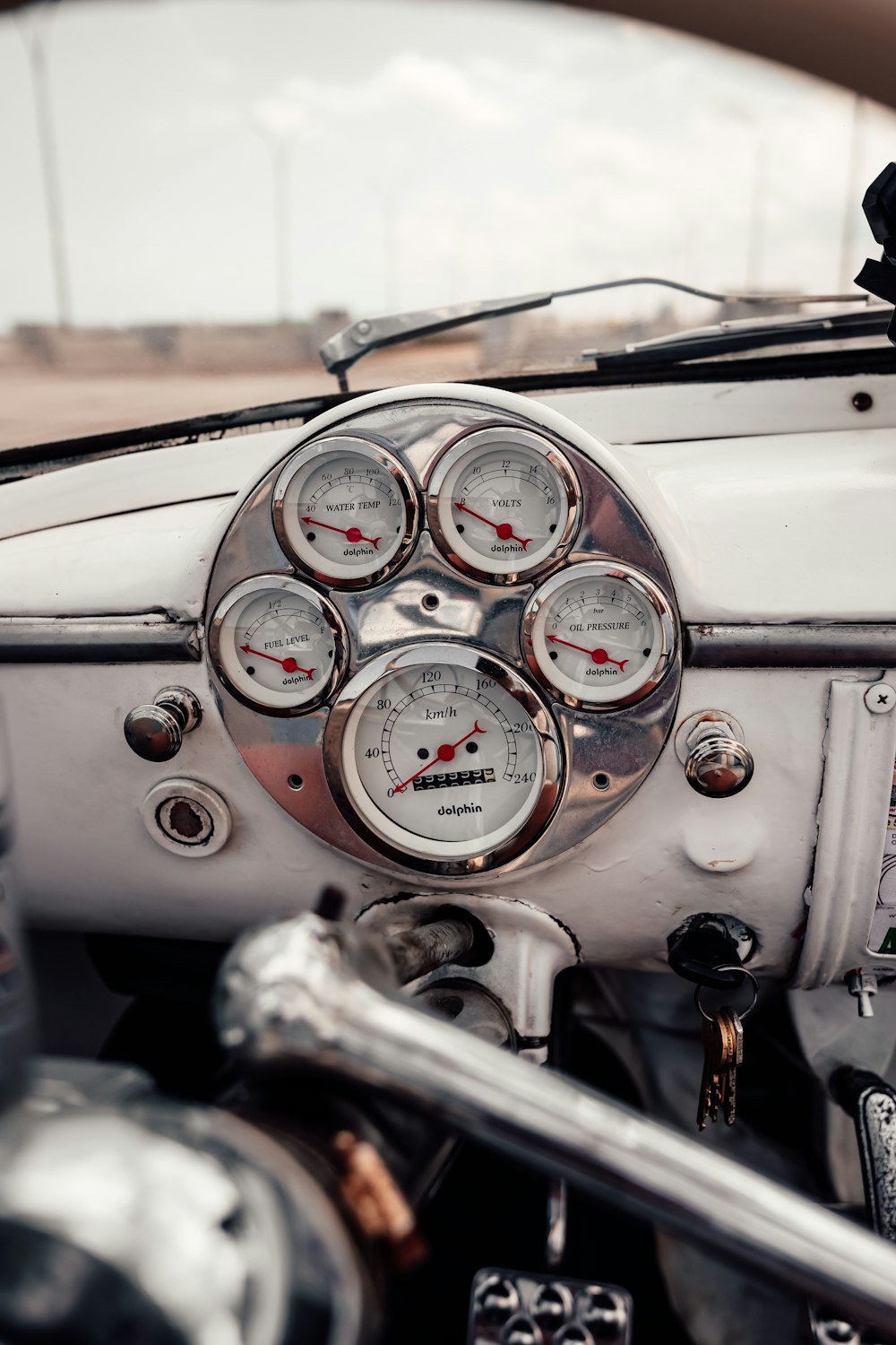 a close up of a speedometer and dashboard of a vehicle