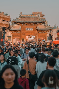 Exterior view of Tis Hazari Court complex entrance bustling with people.