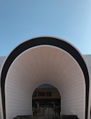 The entrance of Lycée de Pékesse with its clean, modern facade.
