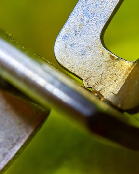 Close-up of a textured 3D object with bright yellow and blue highlights.