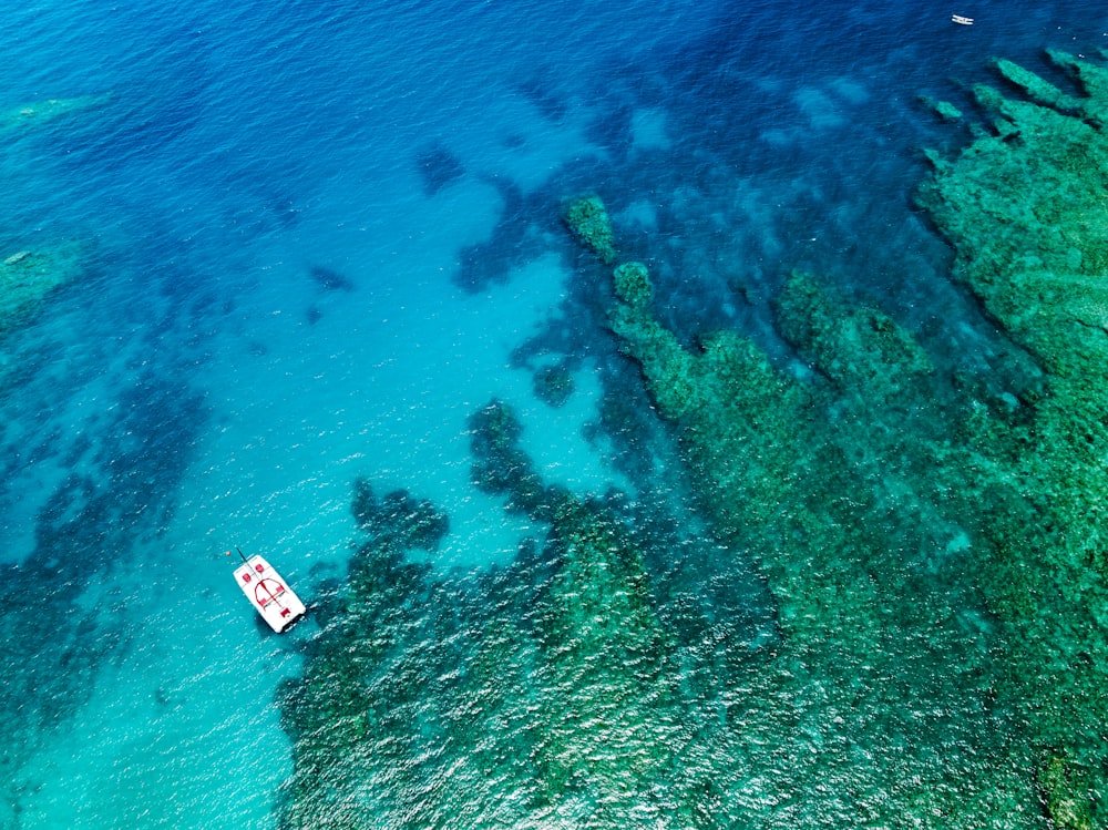 a boat floating on top of a body of water