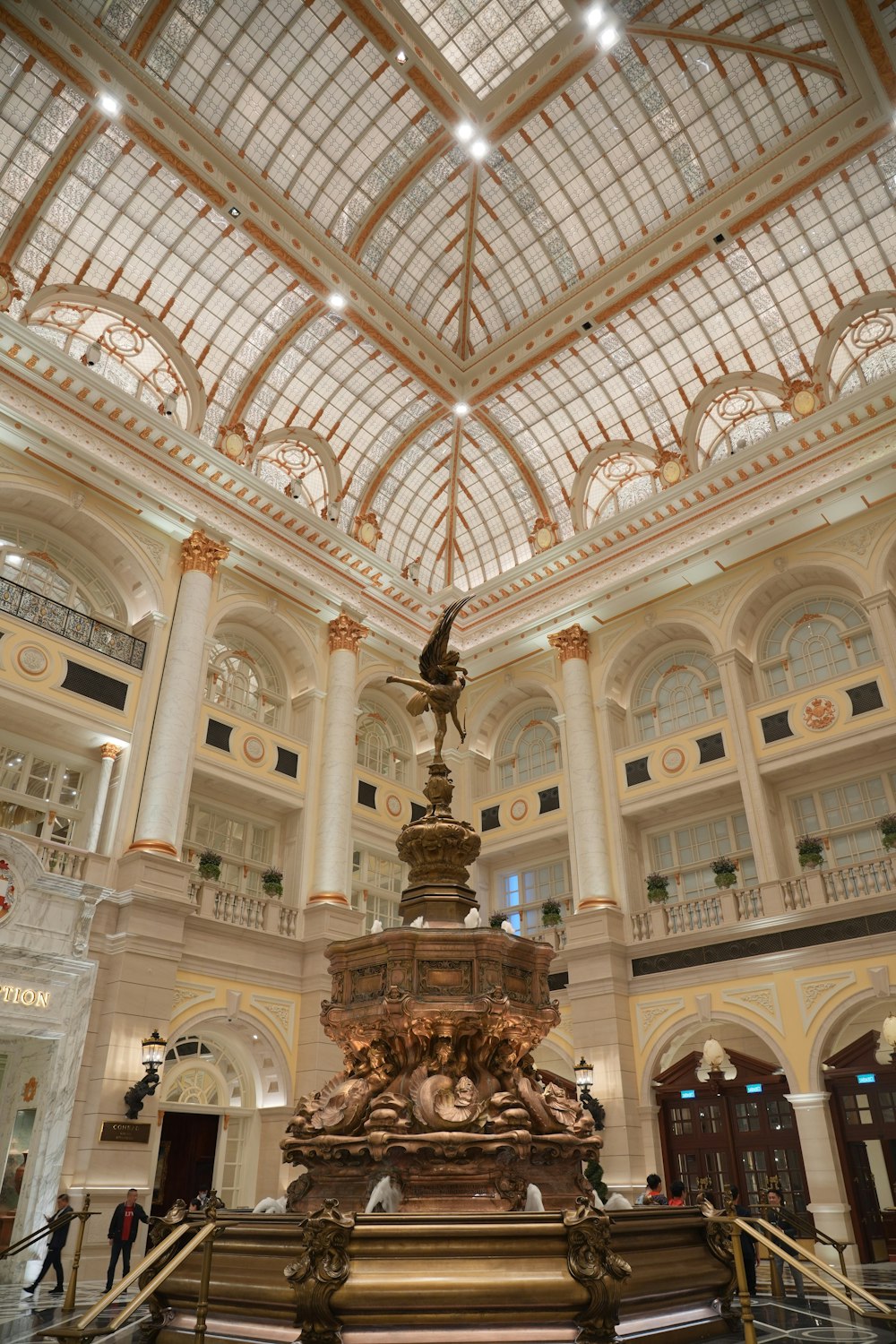 a large building with a fountain inside of it