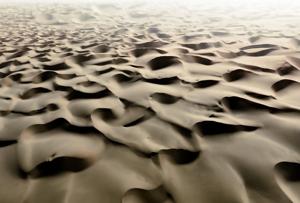 a large amount of sand dunes in the desert