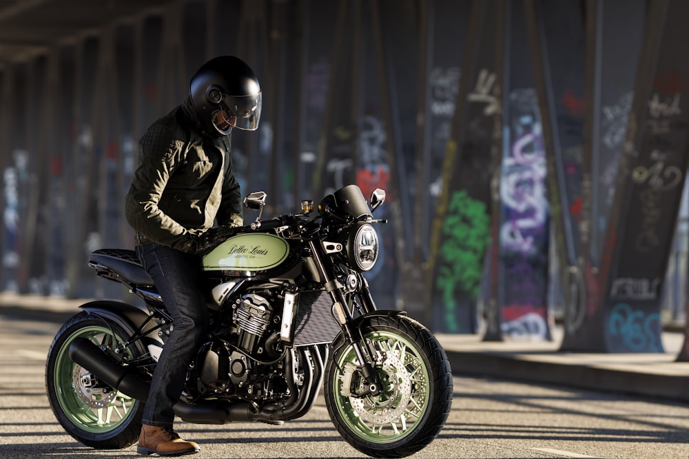 a man sitting on a motorcycle on the street