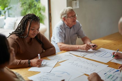 Parents and educators collaborating around a table