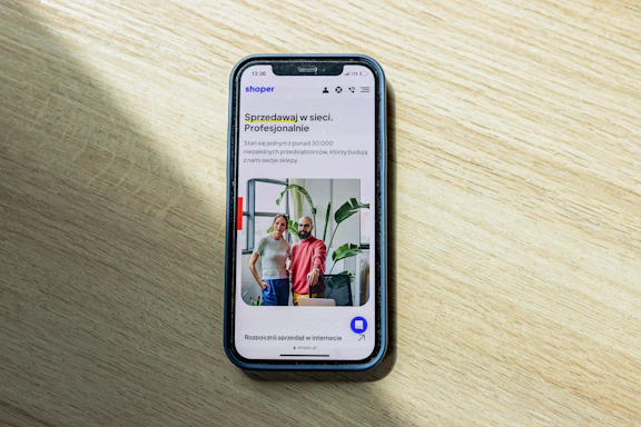 Photo of Rafał and Ania collaborating in a modern office space filled with creative energy.