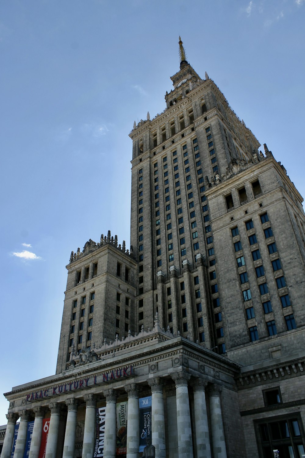 a very tall building with a very tall clock tower