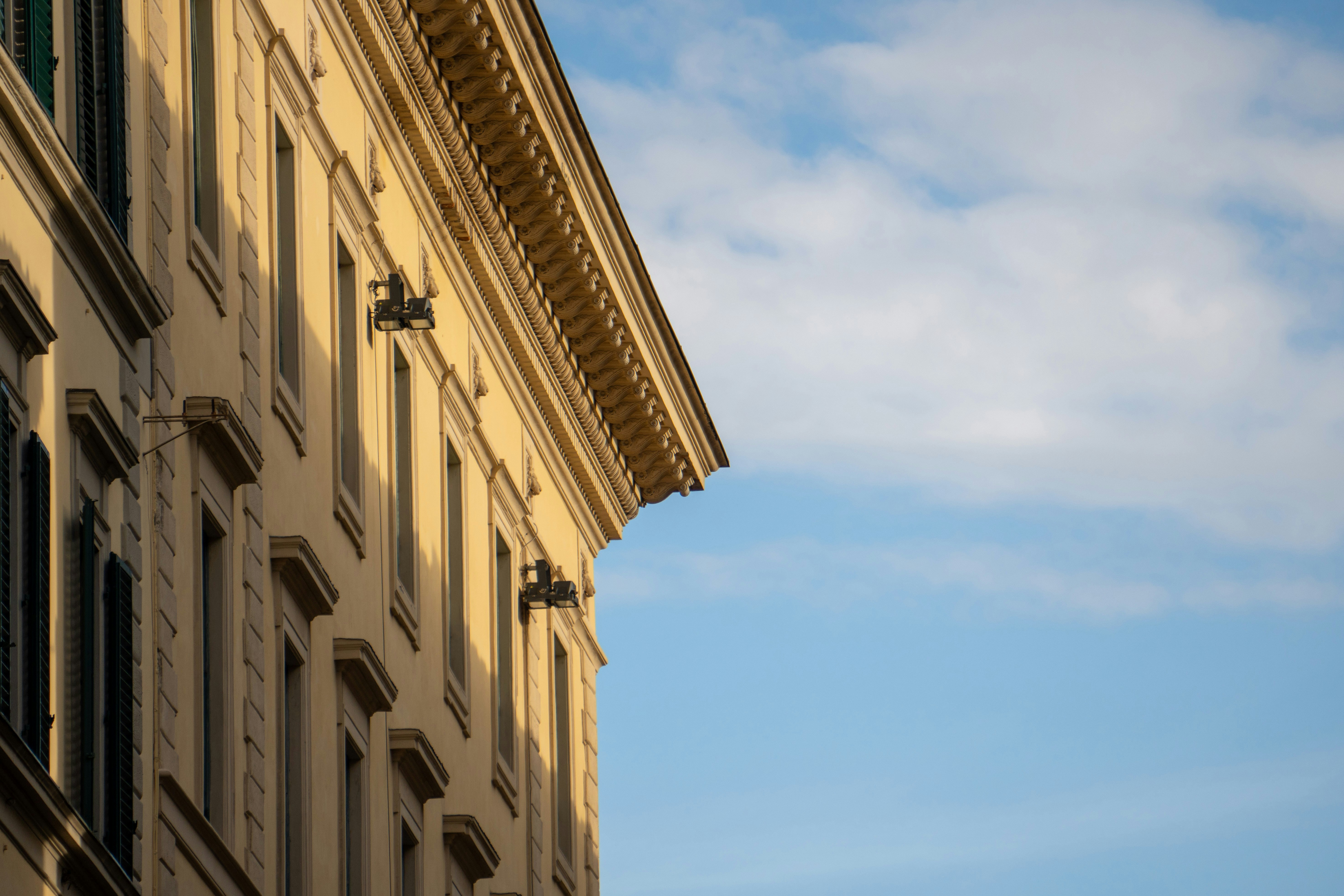 A tall building with a clock on the side of it