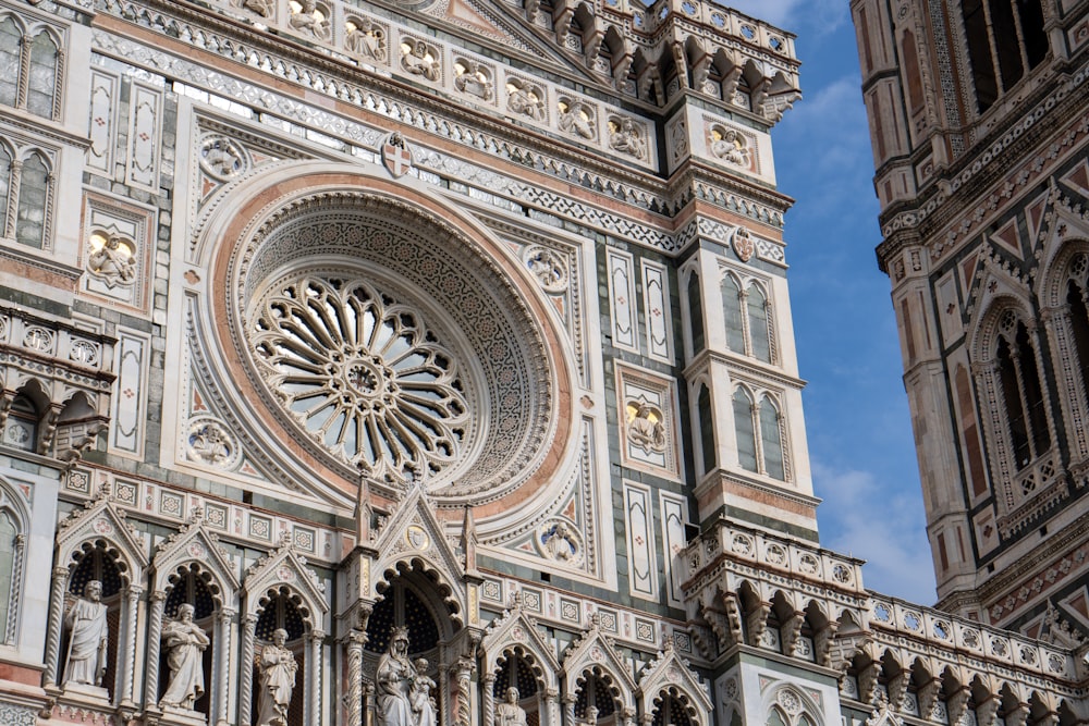 a large cathedral with a clock on it's side