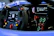 Close-up of a branded XR Grand Prix vehicle dashboard displaying real-time racing data.