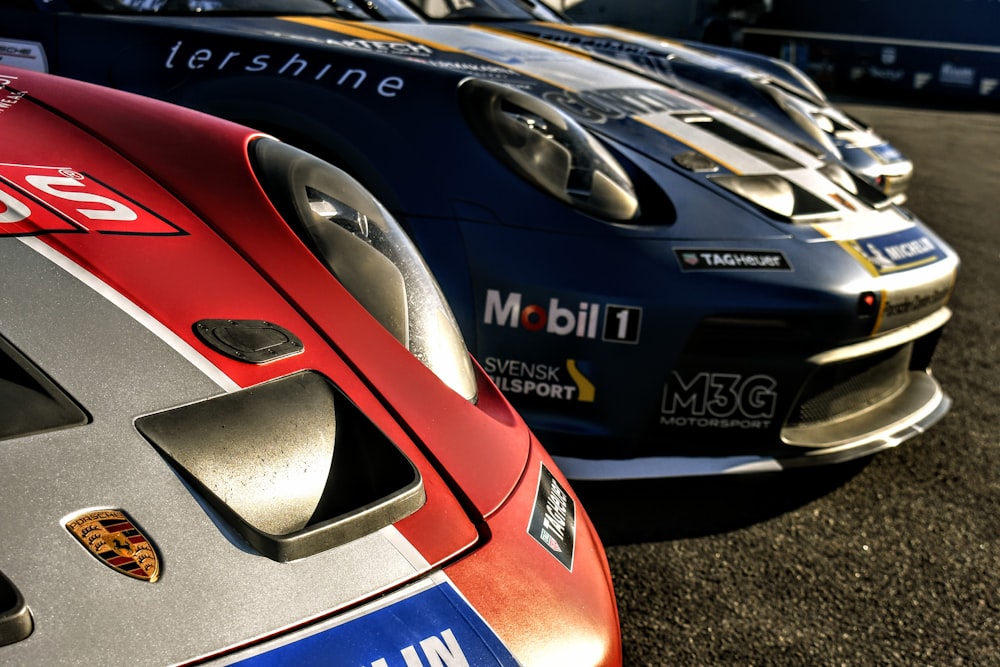 a row of racing cars parked next to each other