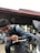 A happy customer riding a motorcycle purchased from af motos.