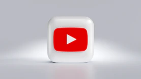a white square button with a red arrow on it