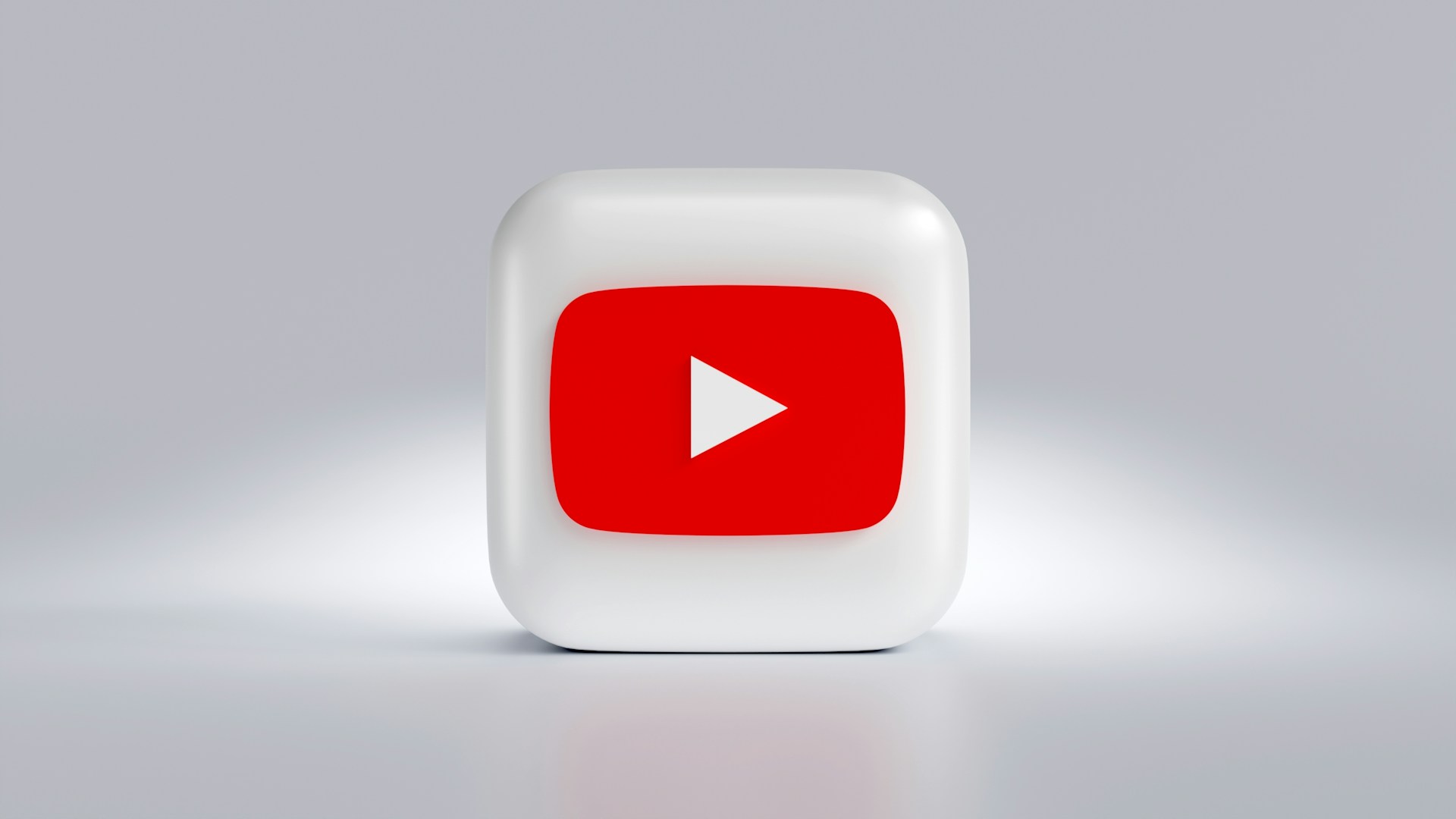 a white square button with a red arrow on it