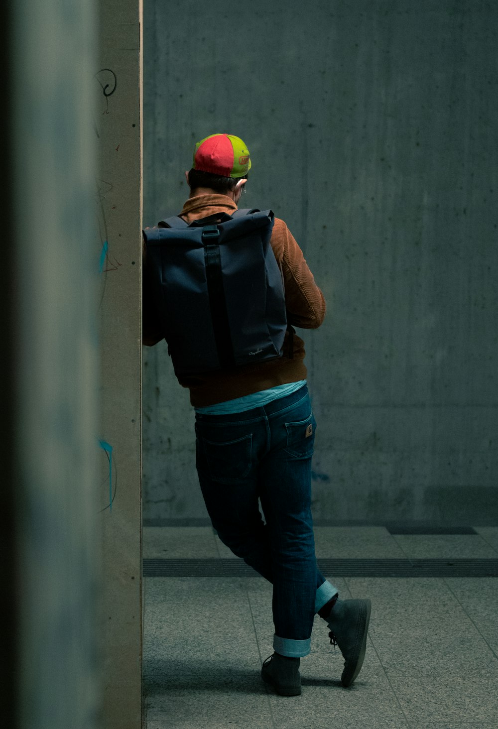 a person with a backpack and a ball on their back