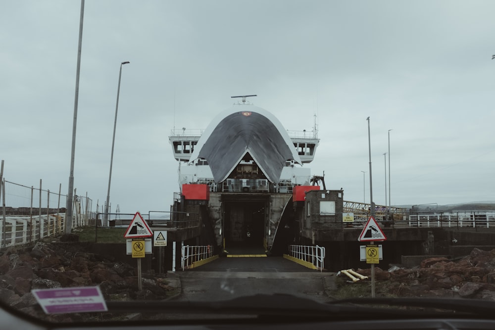 a large boat is docked at a dock