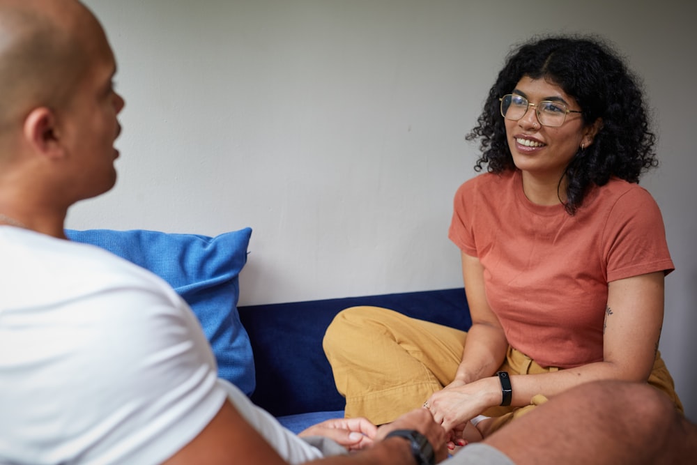 a man and a woman sitting on a couch