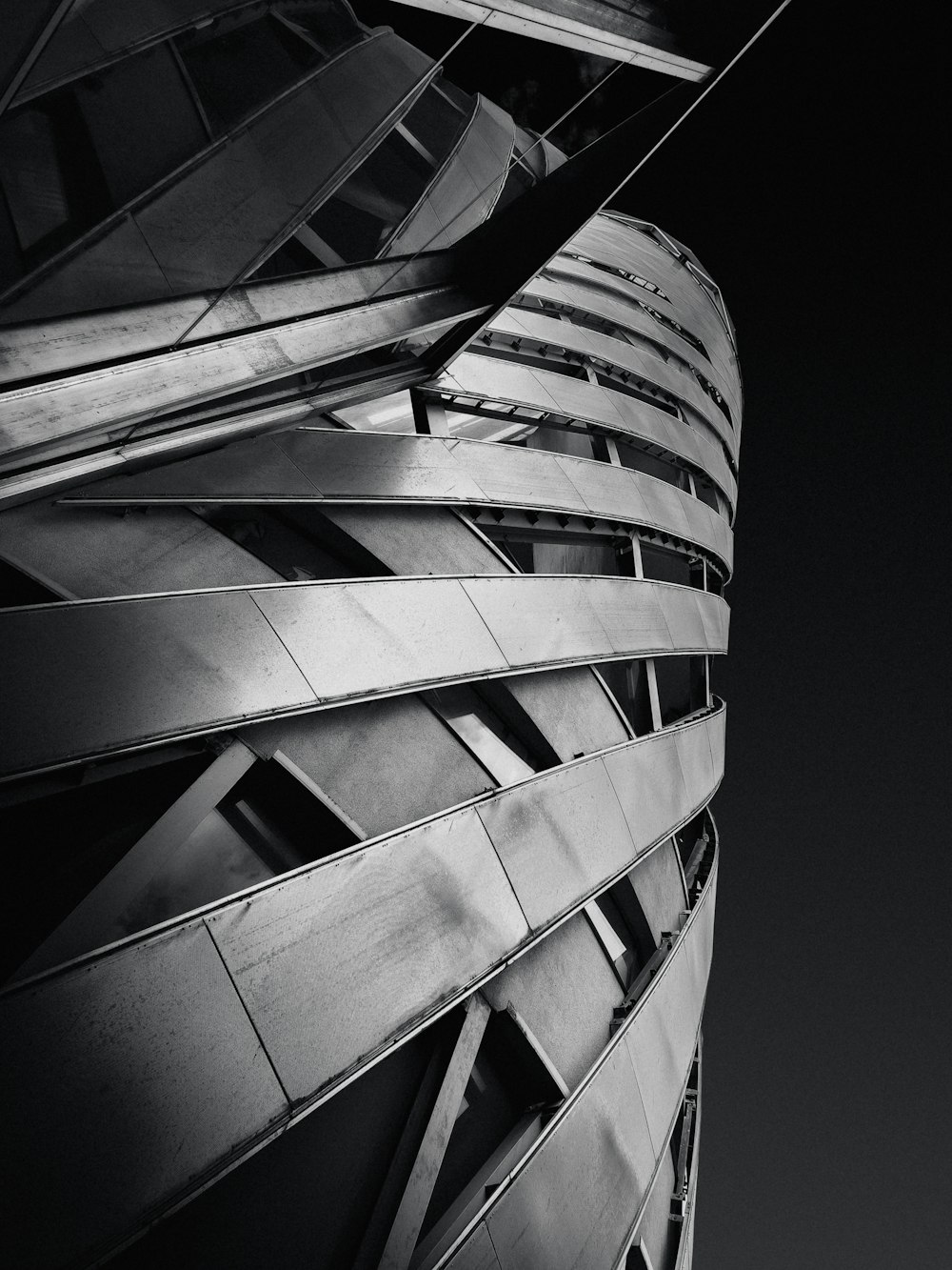 a black and white photo of a tall building