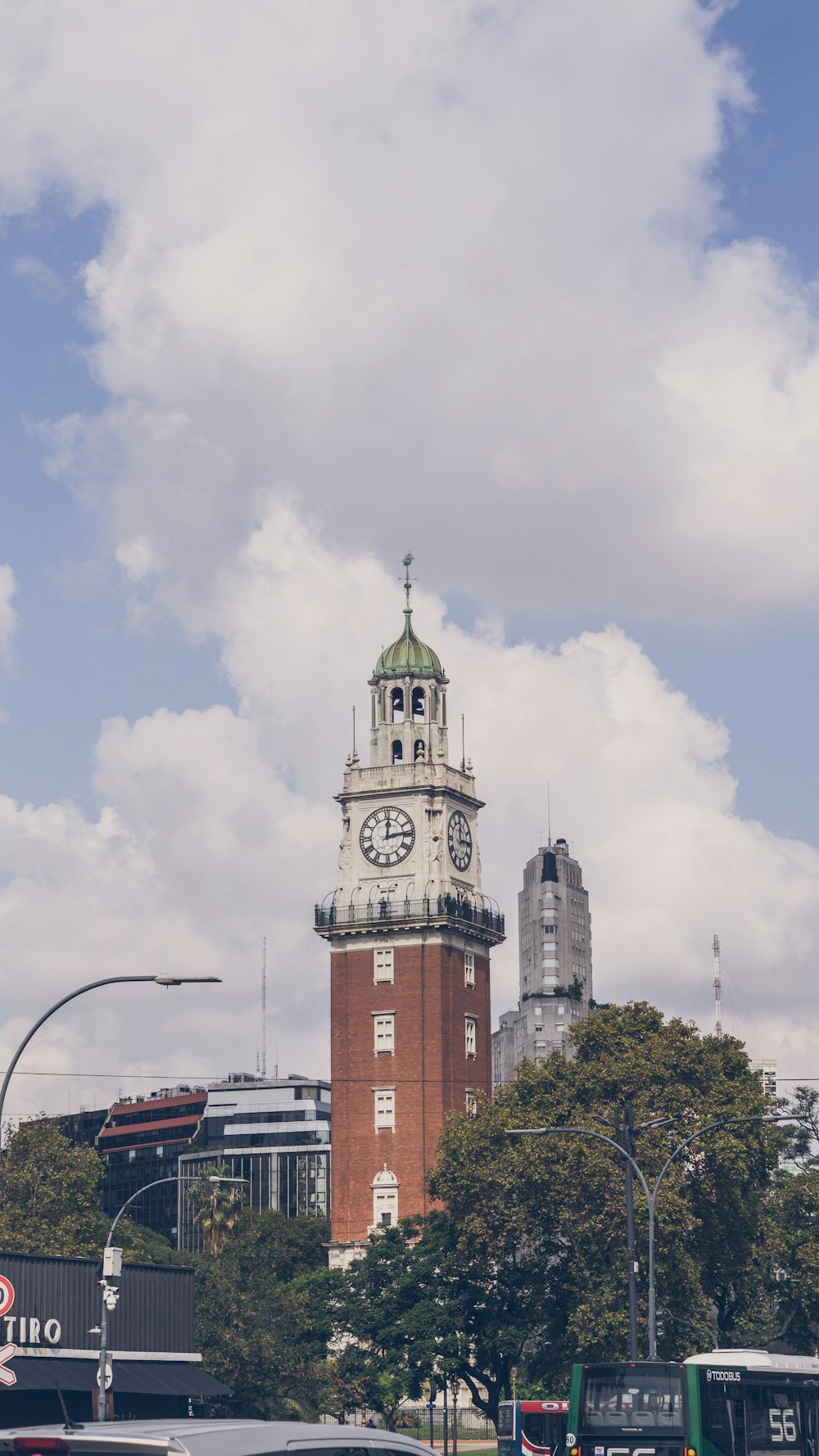 a large clock tower towering over a city