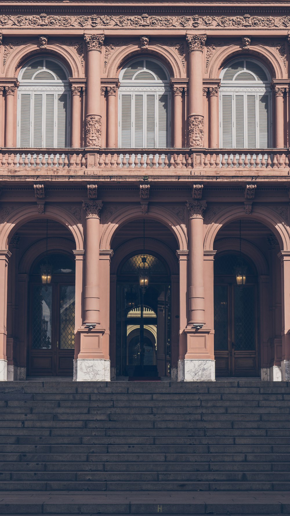 a large building with stairs leading up to it